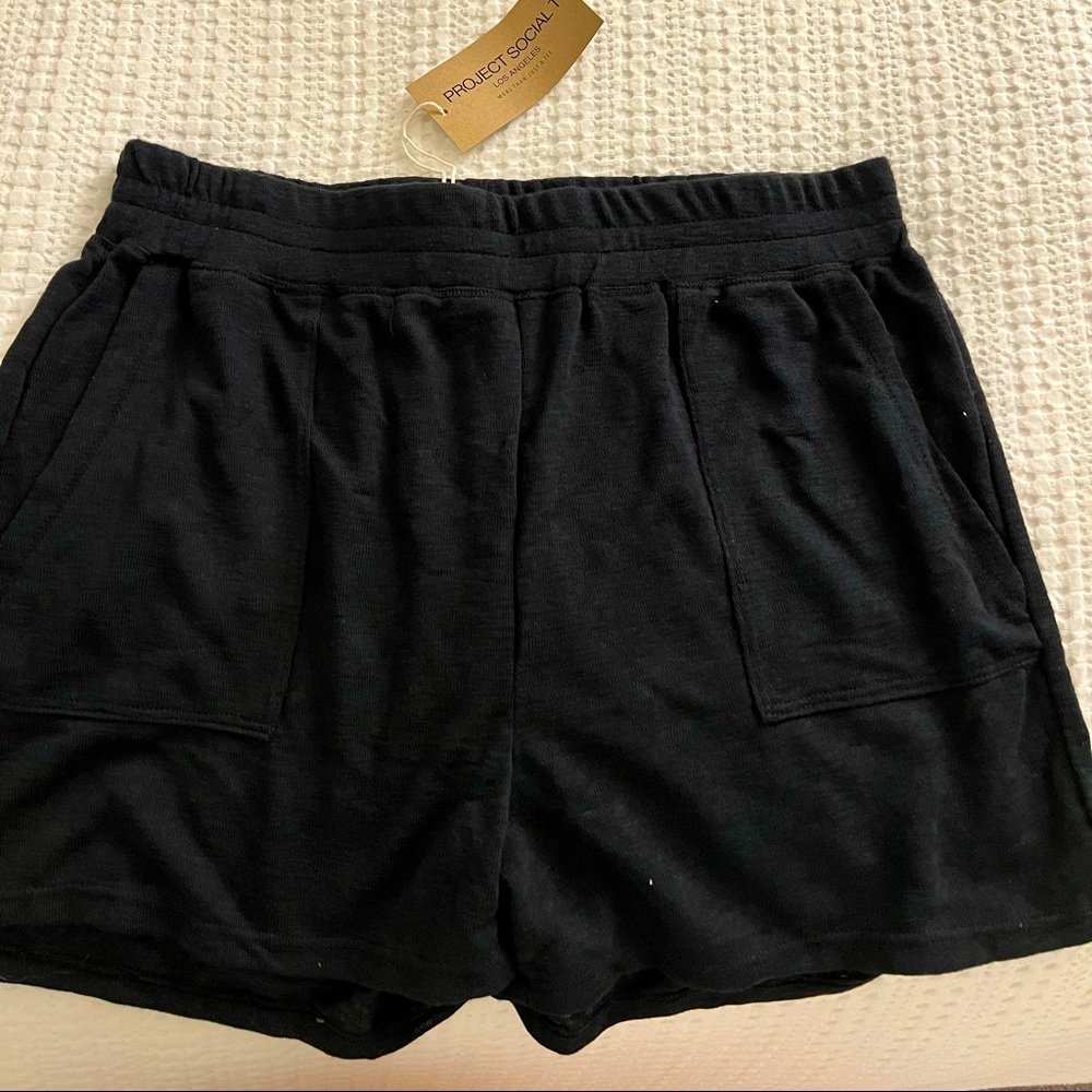 Project Social T shorts